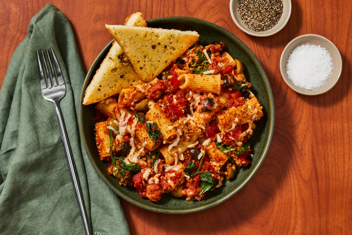 Pasta Puttanesca Bake with Sausage and Plant-Based Mozzarella