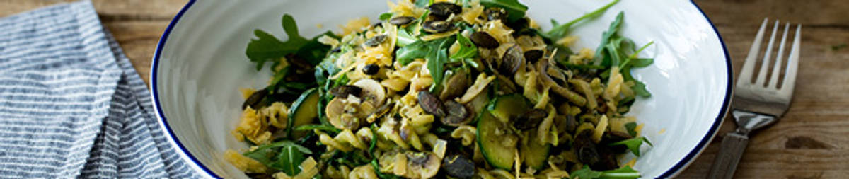 Fusilli integrale met oude kaas en pompoenpitten