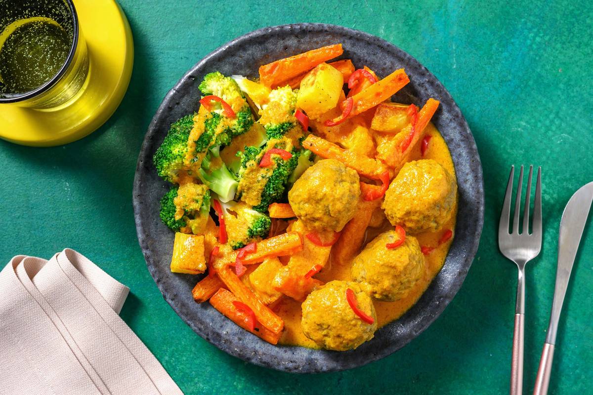 Fleischbällchen in Currysoße mit Ofenkarotten