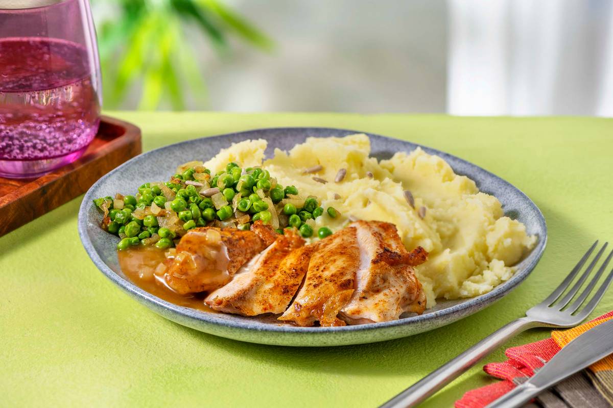 Doperwtenpuree met gestoofde kip en citroen-muntsaus