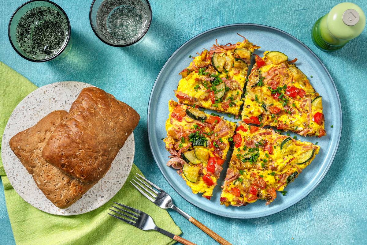 Boerenomelet met achterham, groenten en oude kaas
