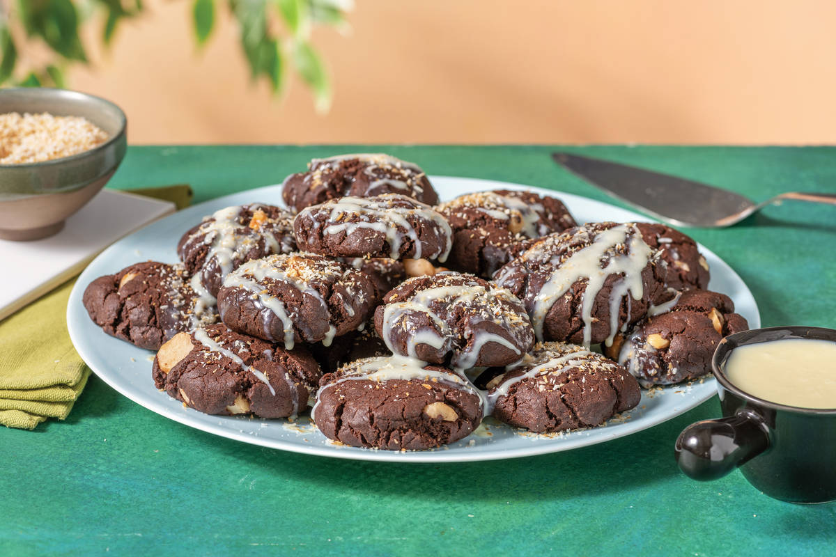Chocolate Macadamia Cookies with White Chocolate Drizzle & Toasted Coconut