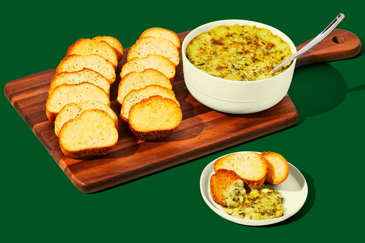 Cheesy Spinach Artichoke Dip with Toasted Baguettes