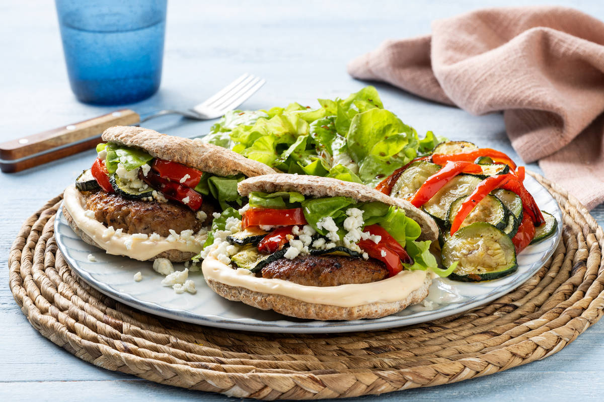 Pita with Steak Haché, Roasted Vegetables and Chili-Labneh Dip