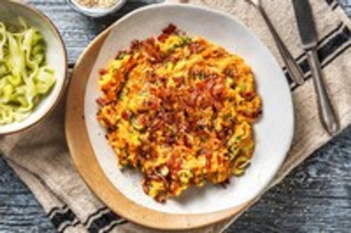 Paksoi-stamppot met spekjes en rode peper