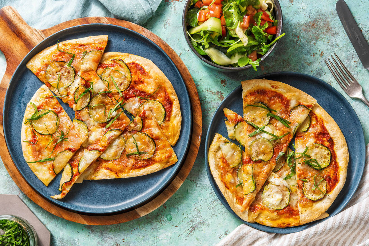 Tarte flambée garnie de mozzarella de bufflone et courgette