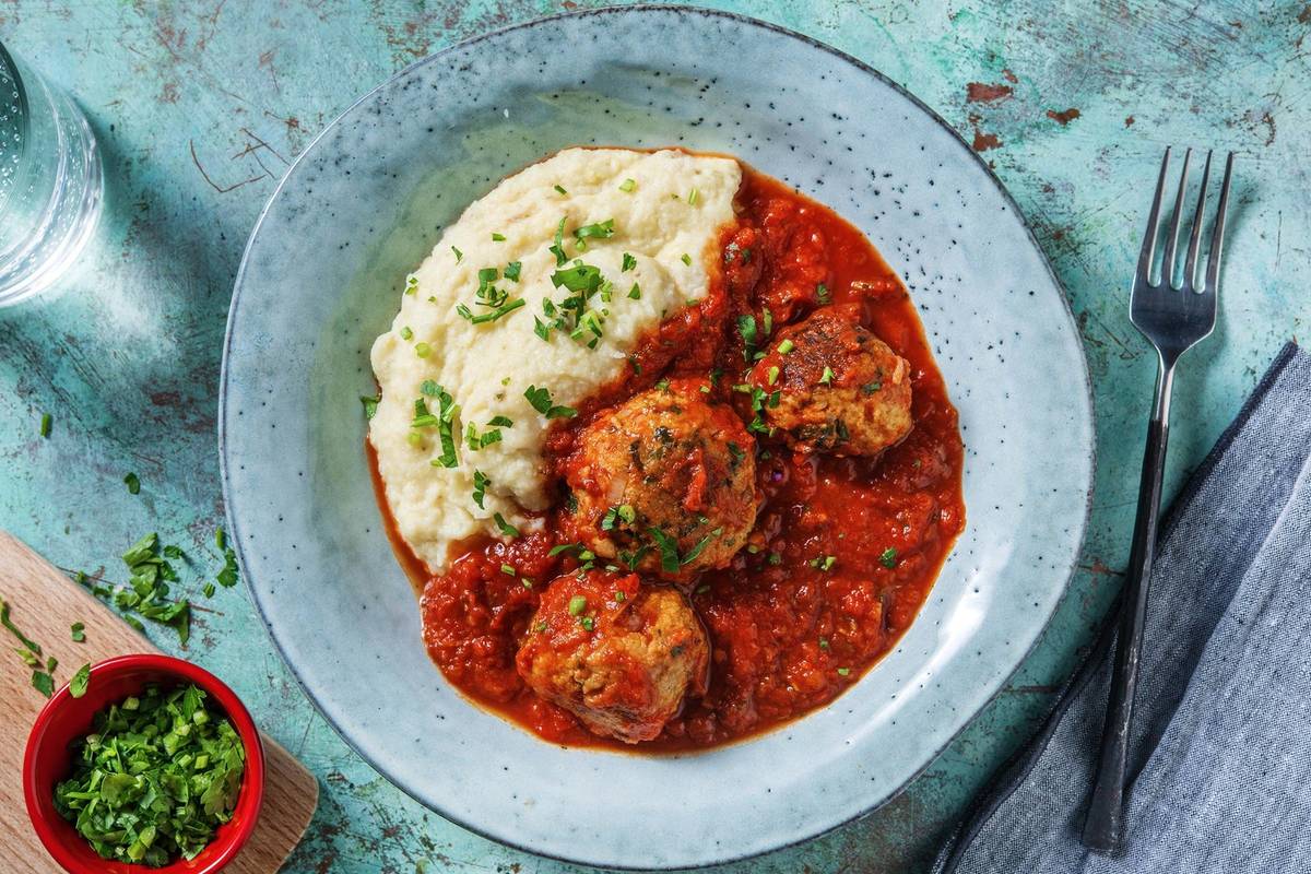 Bloemkoolpuree met gehaktballen in tomatensaus