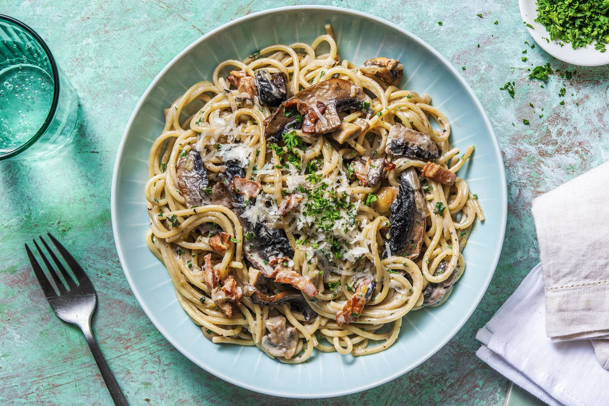 Spaghetti met champignonroomsaus en spekjes