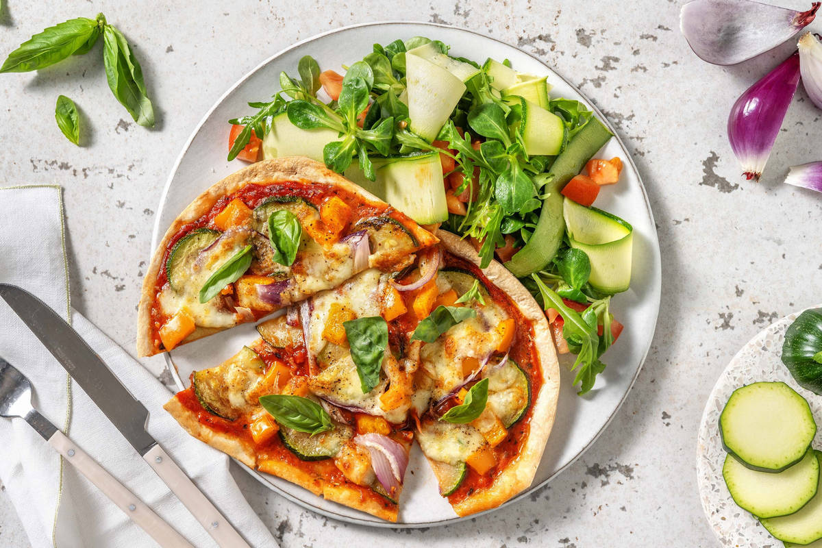 Flammekueche garnie de mozzarella de bufflonne et de courgette