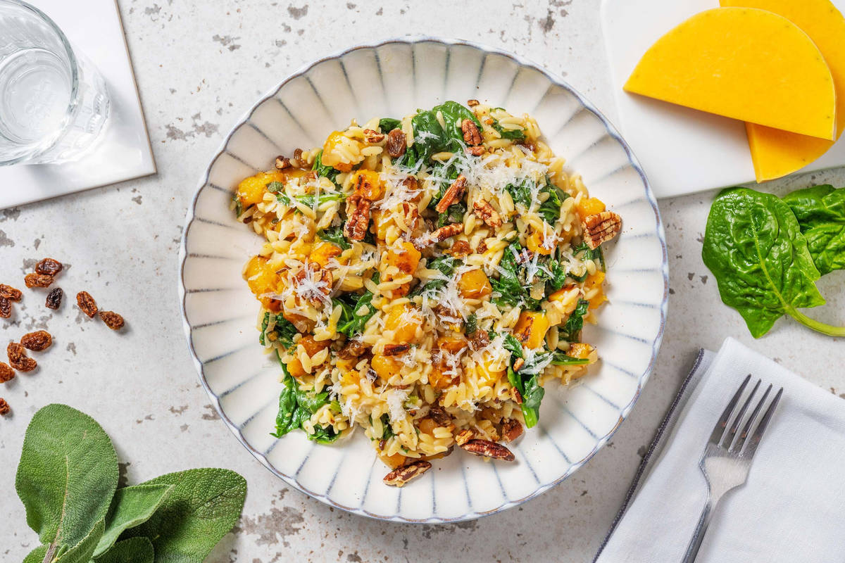 Orzo met pompoen, spinazie en geraspte kaas