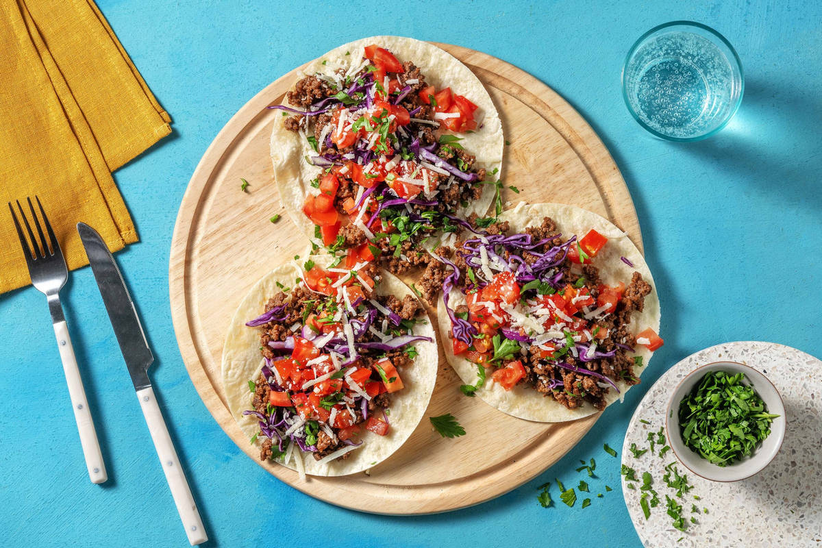 Tostadas speziate di carne e formaggio