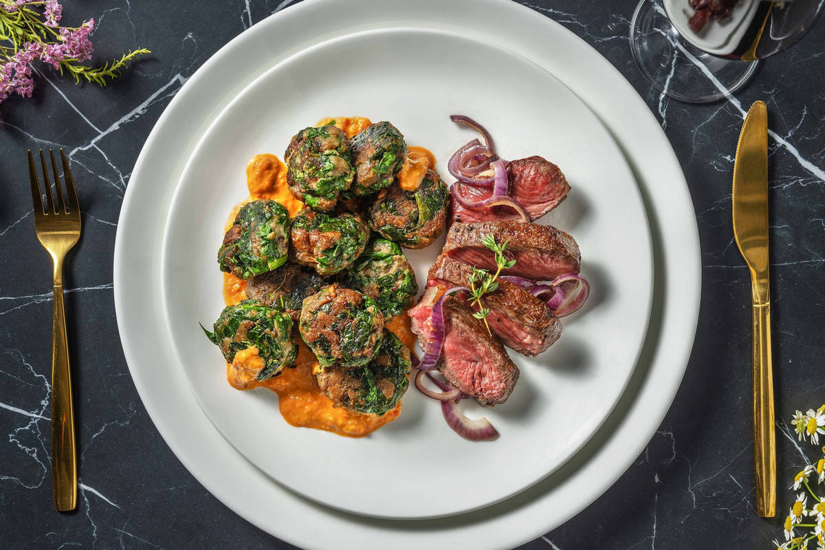 Tagliata di manzo con polpette di pane e spinaci