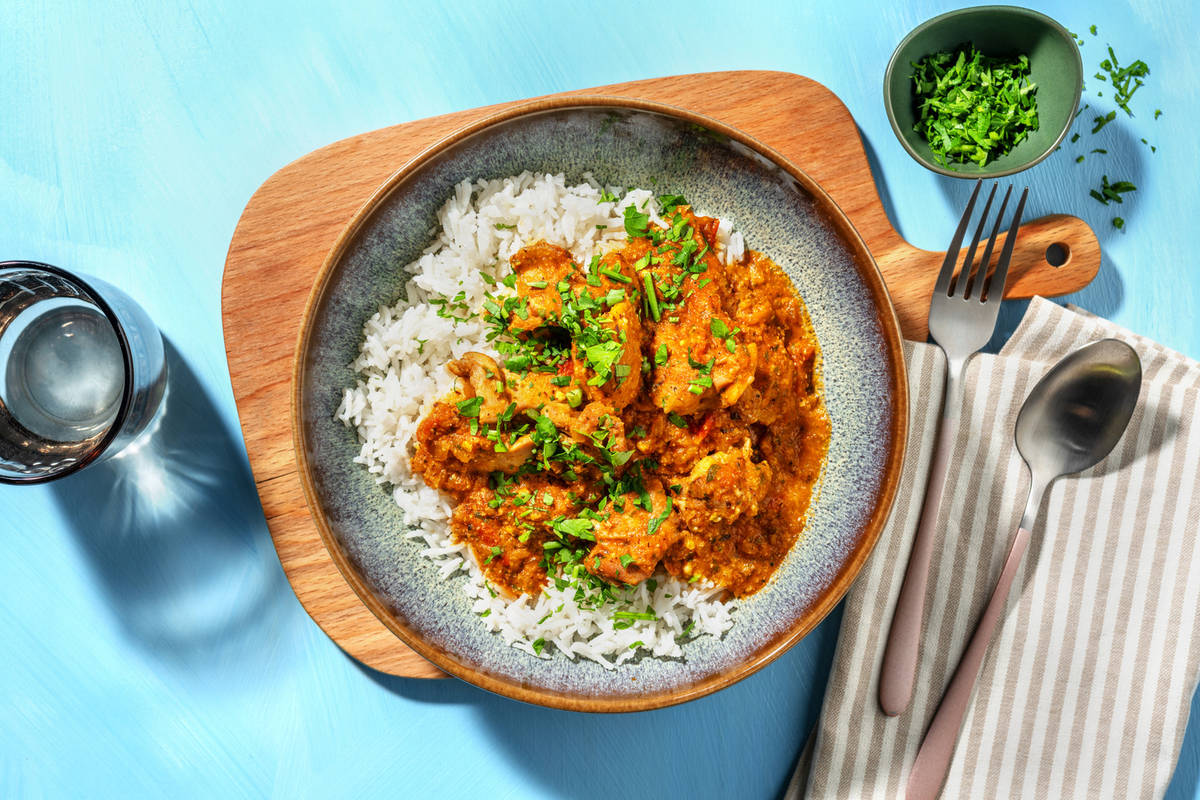 Guiso con extra de pollo con picada de avellanas