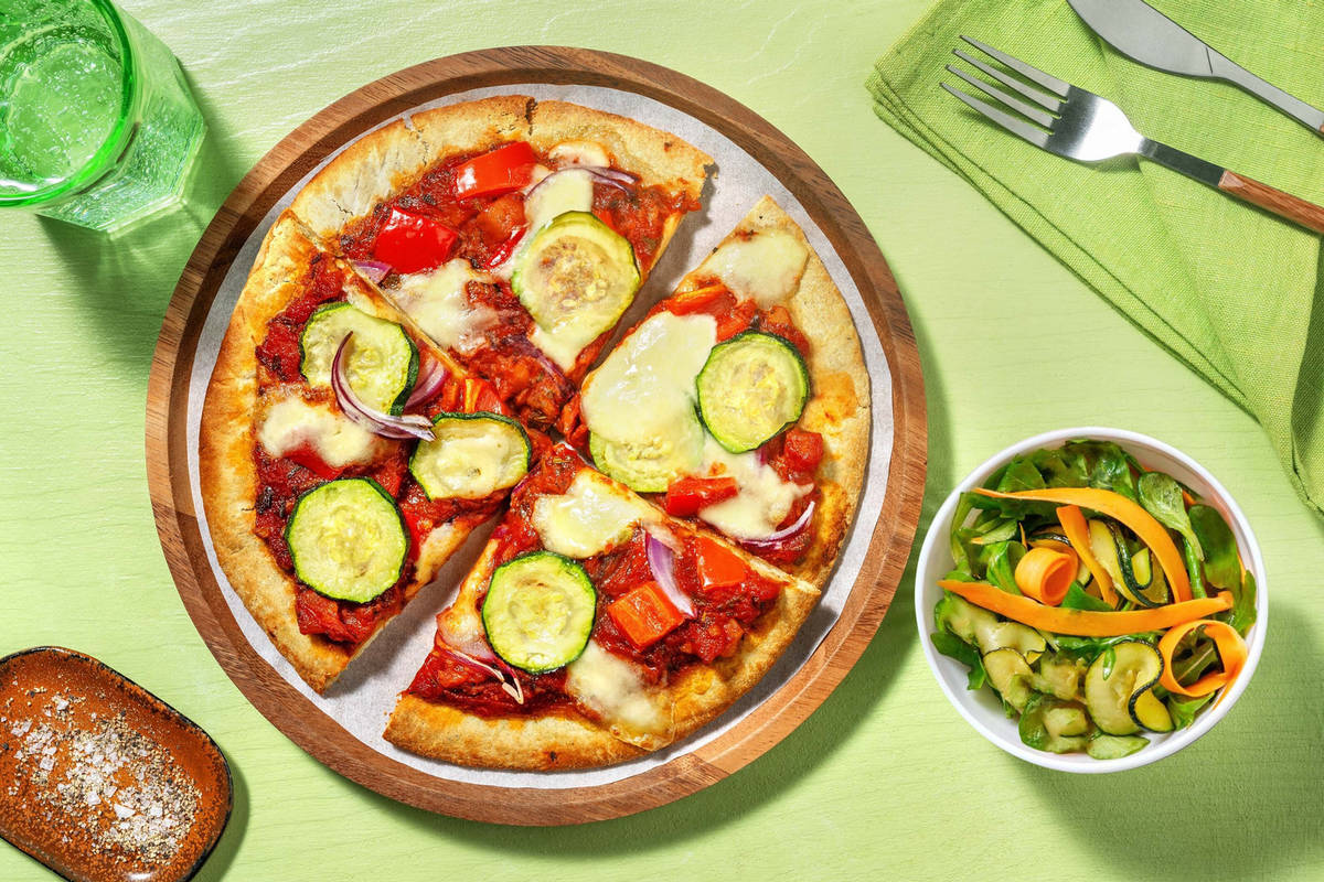 Flammekueche garnie de mozzarella et de courgette