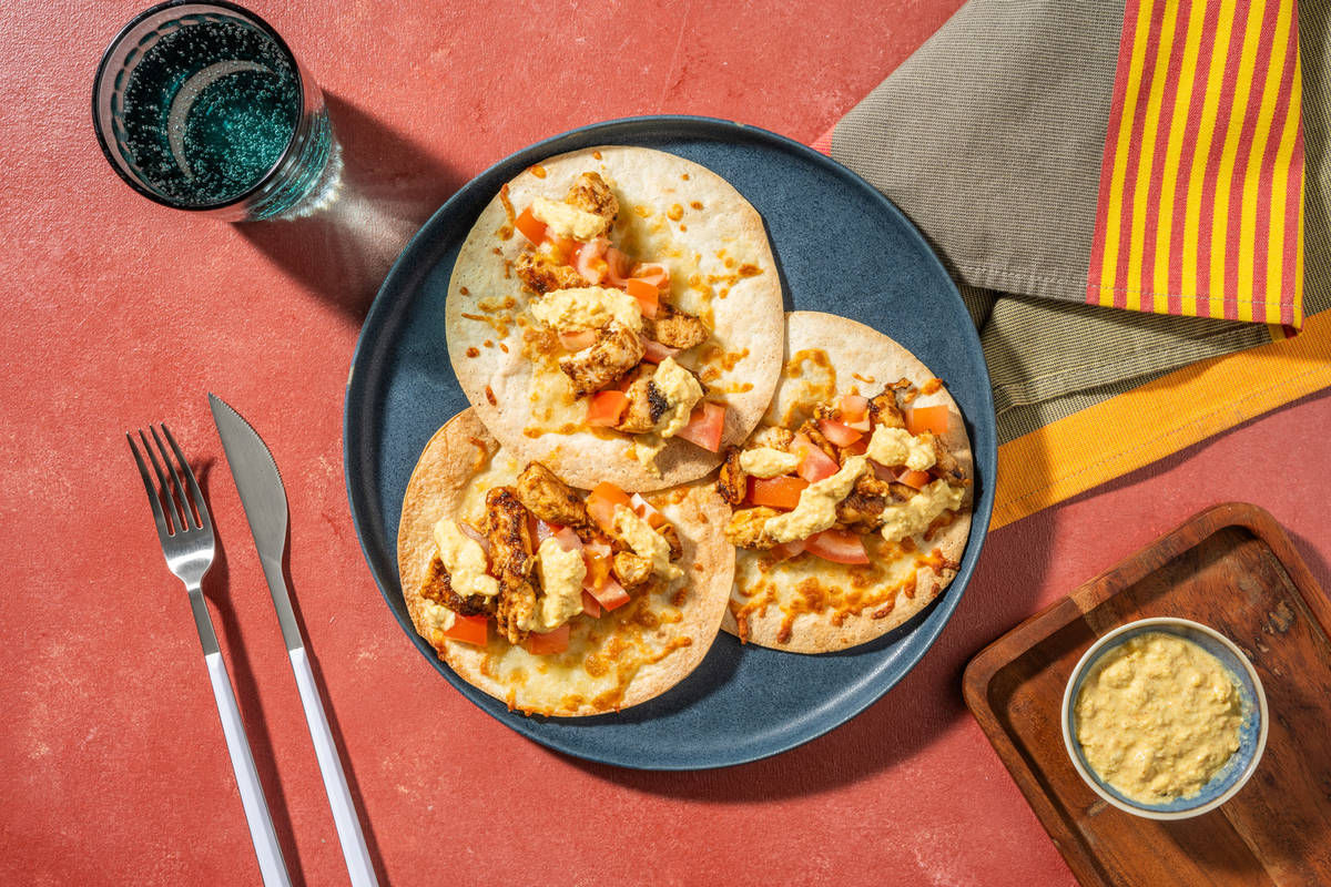 Tacos de pollo con queso fundido