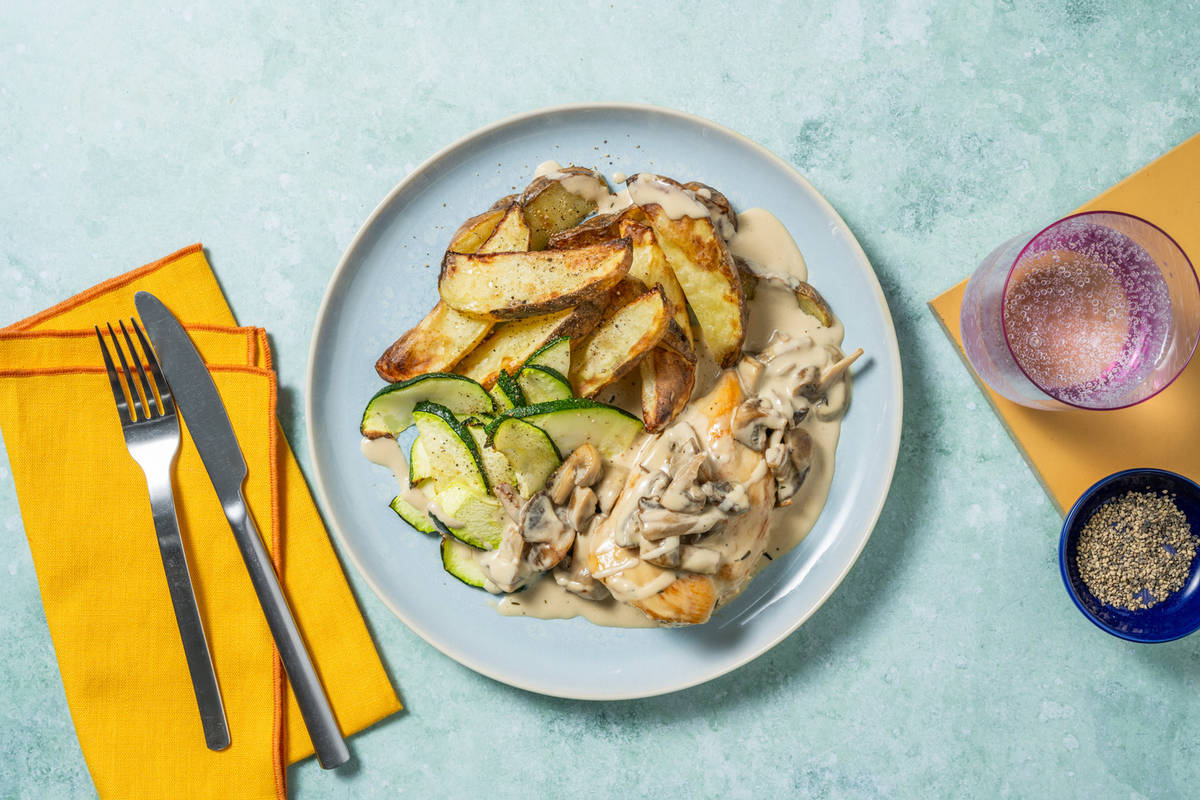 Extra de pollo con salsa cremosa de mostaza y champiñones