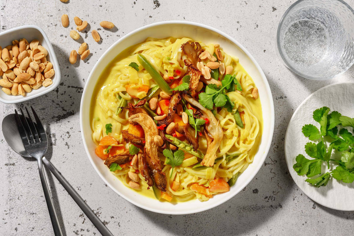 Laksa på ostronskivling och sockerärtor