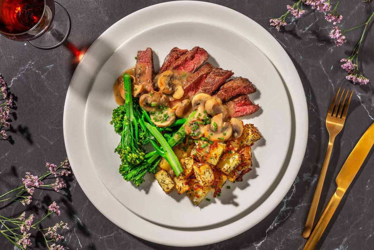 Mushroom Gravy-Smothered Double Striploin Steak 