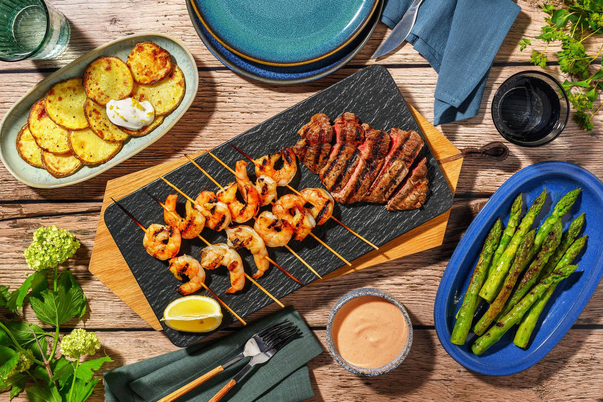 Grilled Montreal-Spiced Double Striploin Steak and Chipotle Shrimp Cocktail 