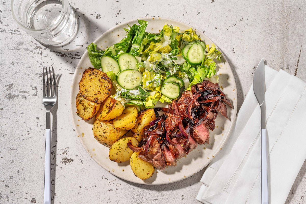 Steak met zoete uienjus