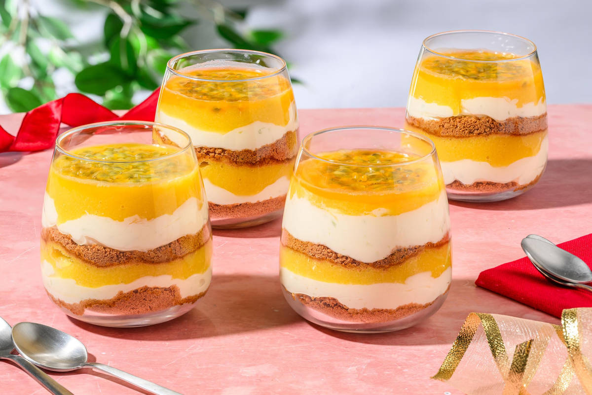 Passievrucht-mangocheesecake in een glas 