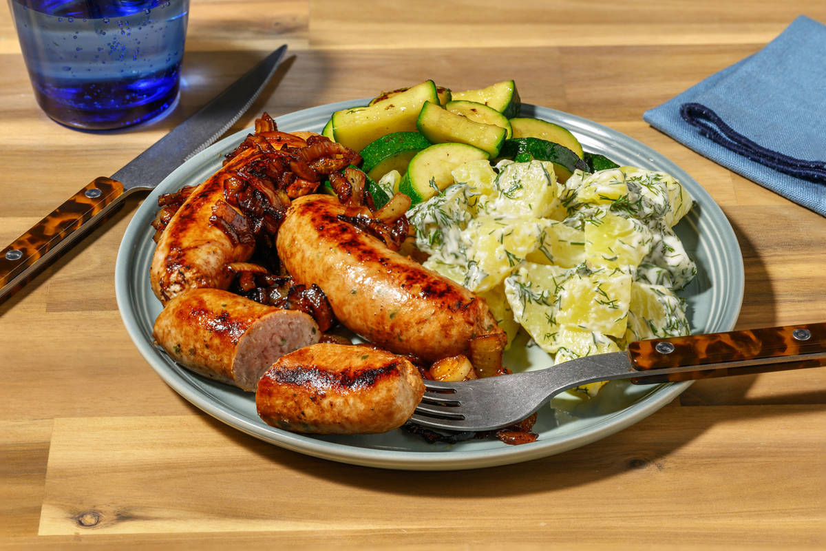 Salchichas encebolladas