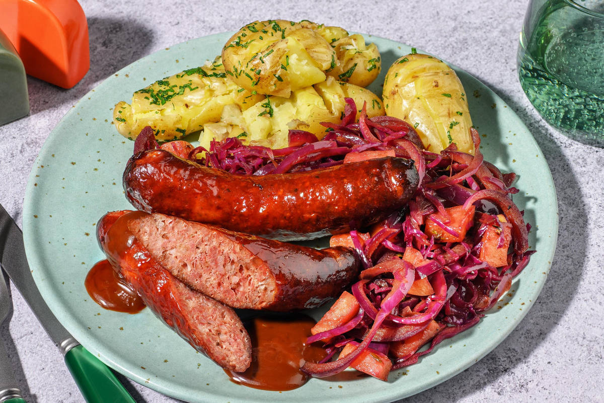 Baked pork sausage and thyme braised cabbage