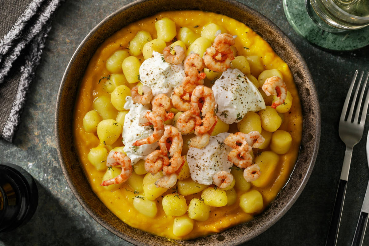 Gamberetti sfumati all'arancia e burrata a fiocchi