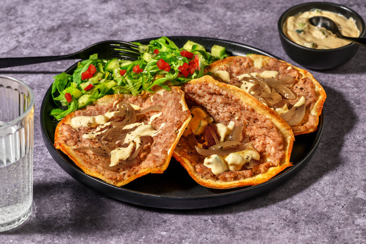 Smash tacos de cerdo con cebolla caramelizada