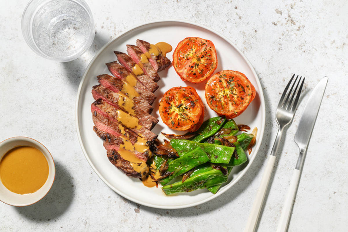 Extra de ternera con tomates asados a las finas hierbas