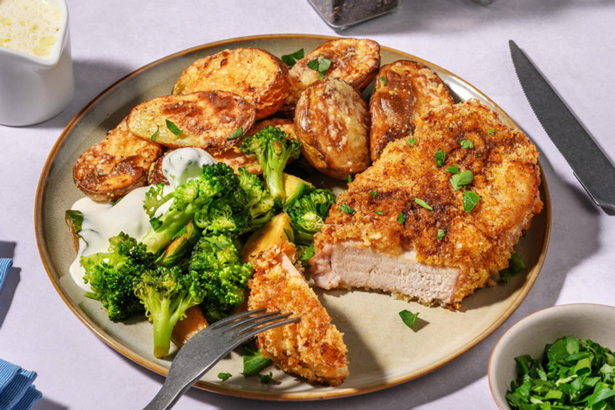 Fläskschnitzel & krispig osttoppad potatis