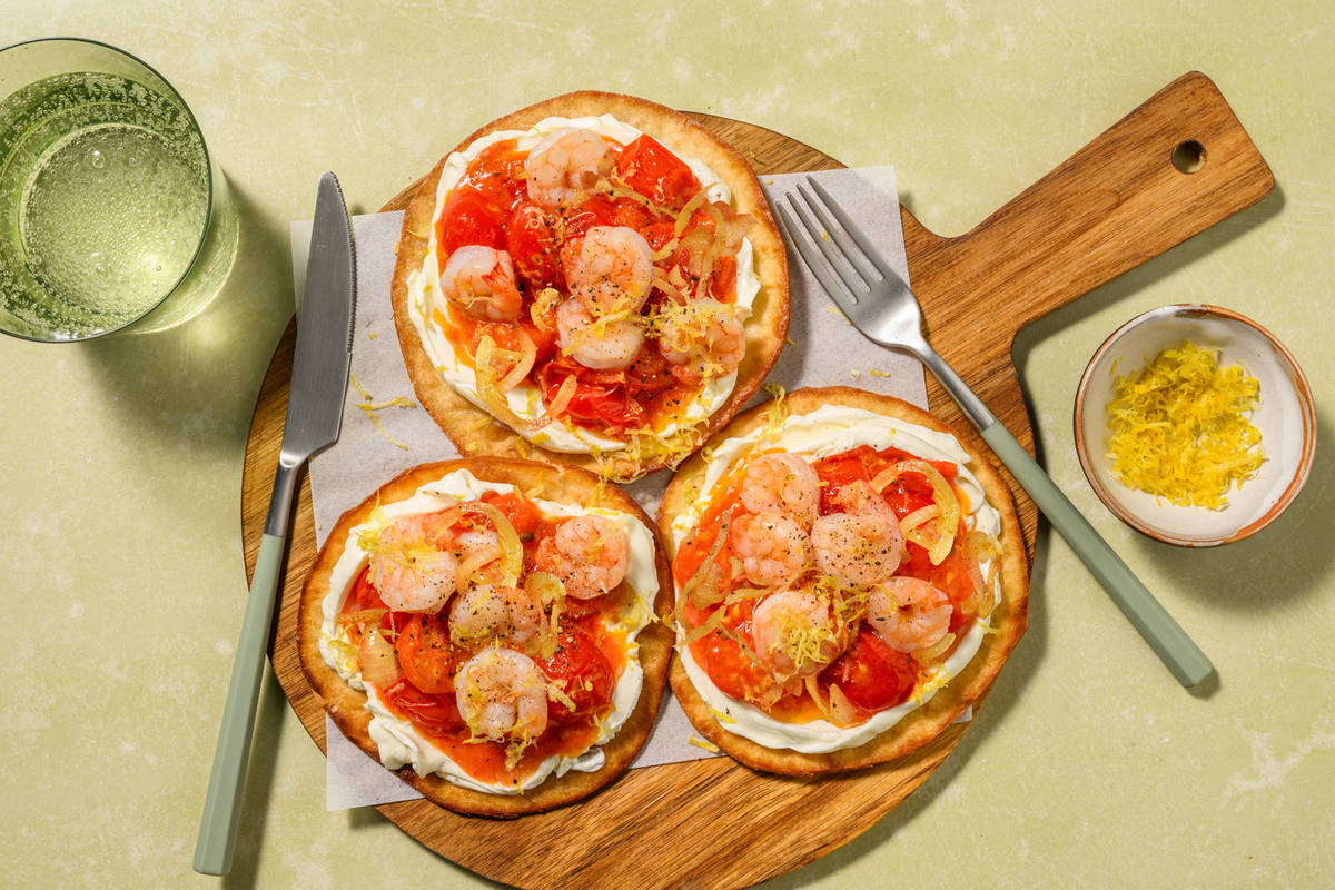 Tostadas crujientes con extra de langostinos con salsa cítrica