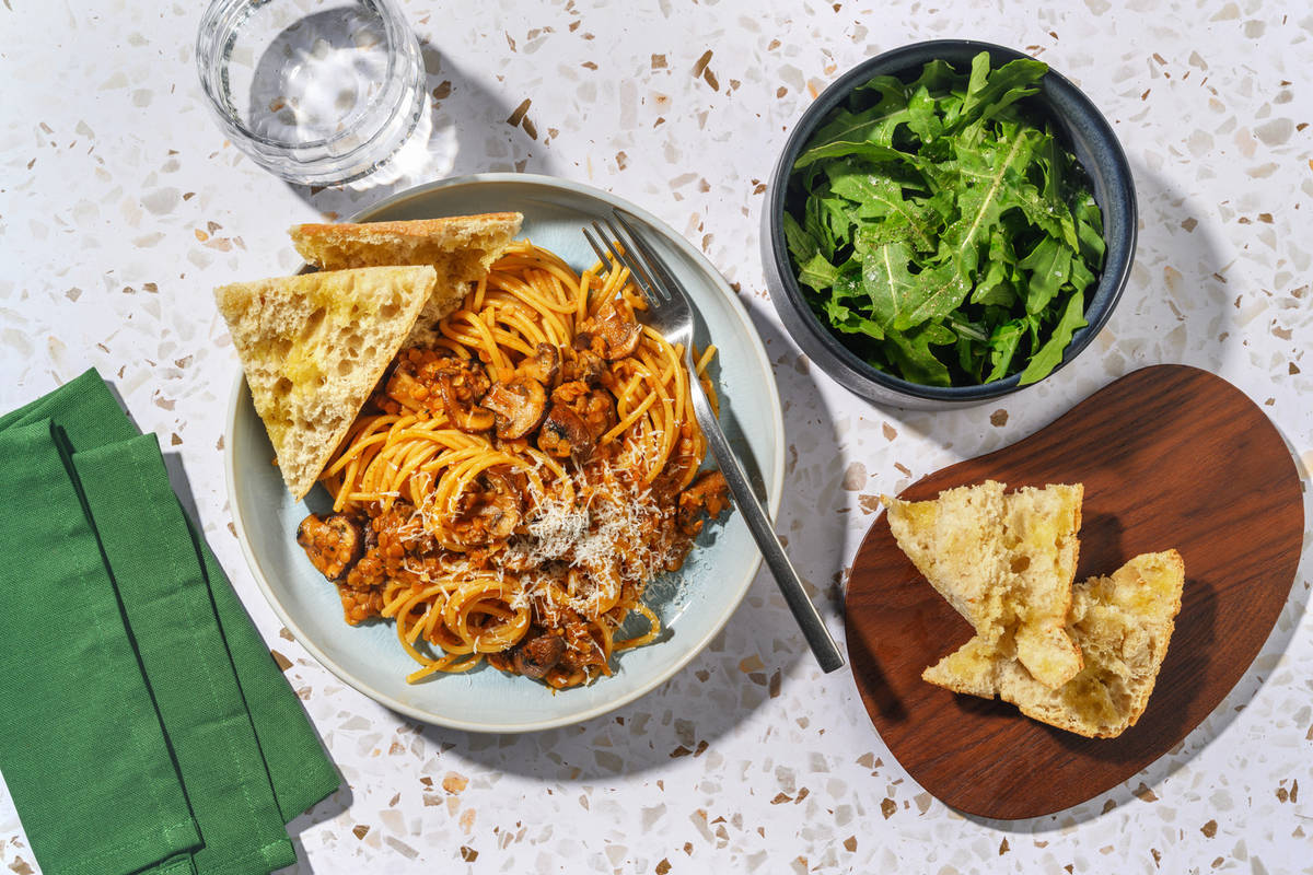 Spaghetti and Veggie Rich Lentil and Bacon Ragu 