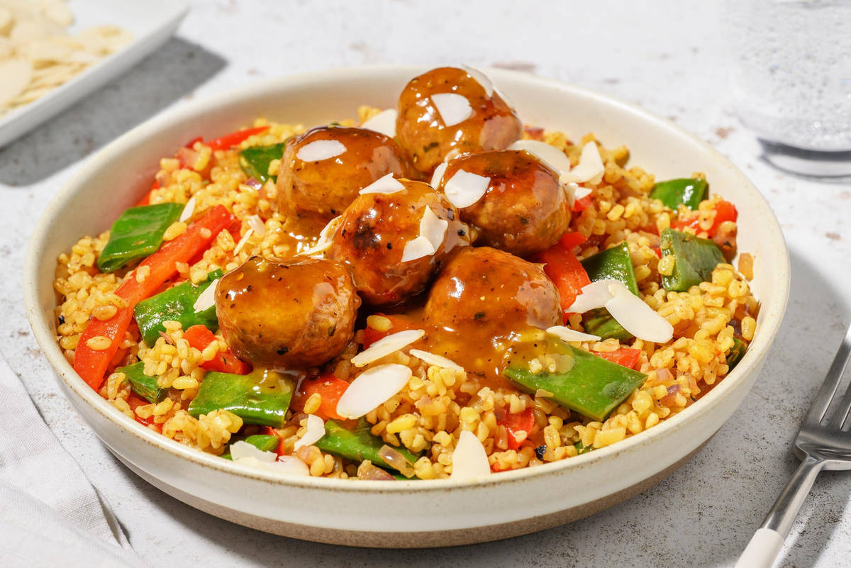 Boulettes de cerf en sauce à l'orange et amandes effilées