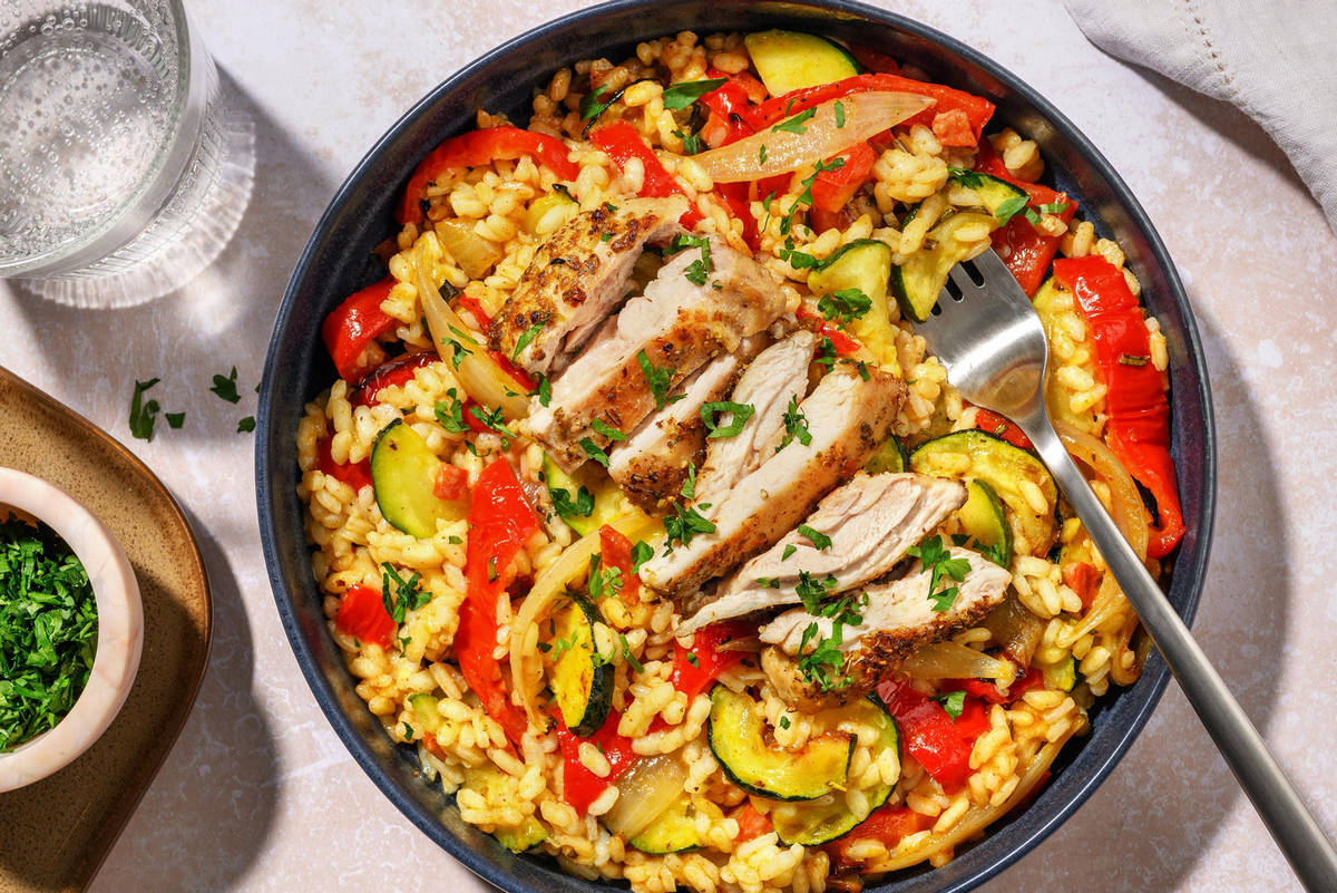 Geroosterde kippendij met rijst à la paella