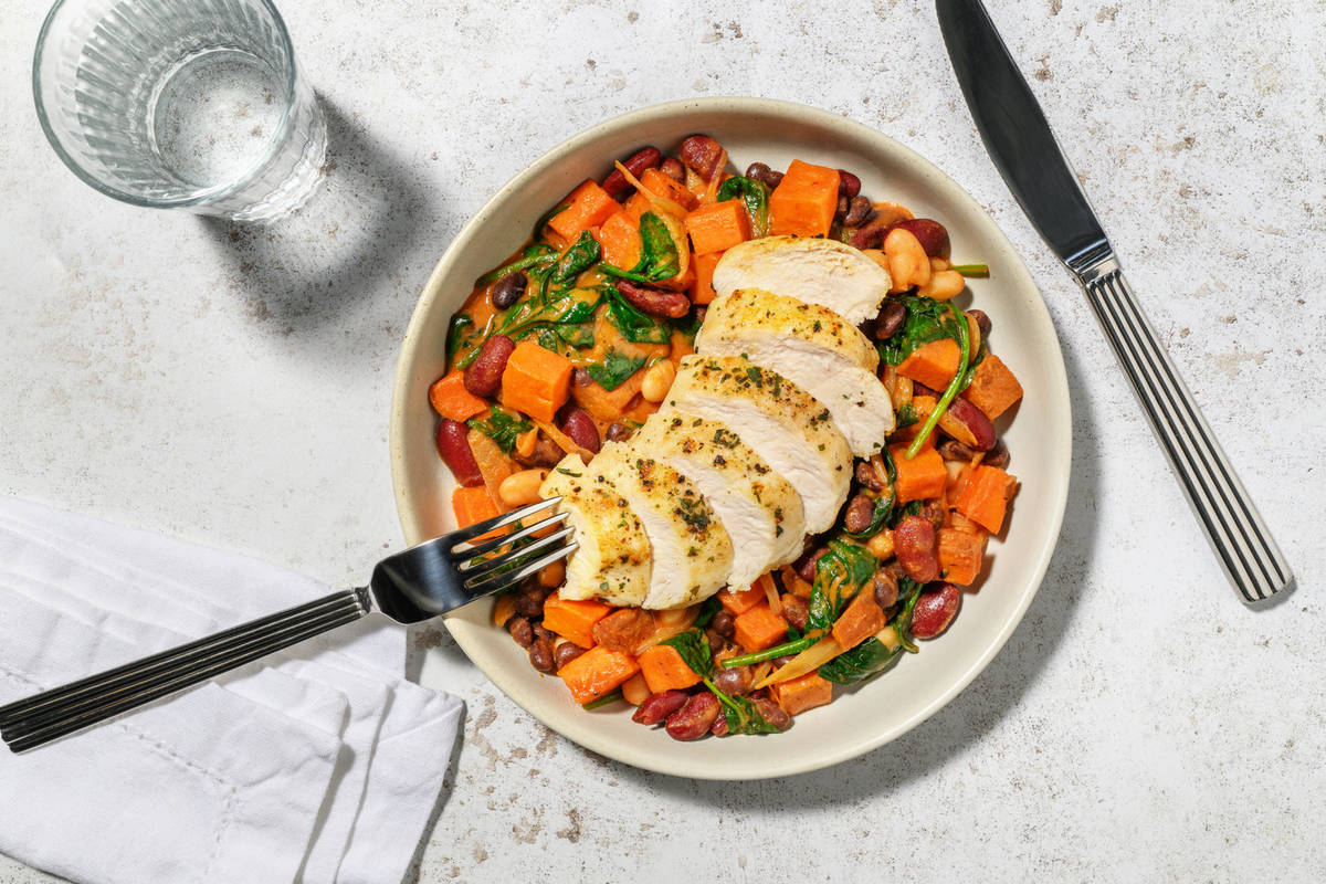 Herby Double Chicken Breast on Creamy Cajun Stew