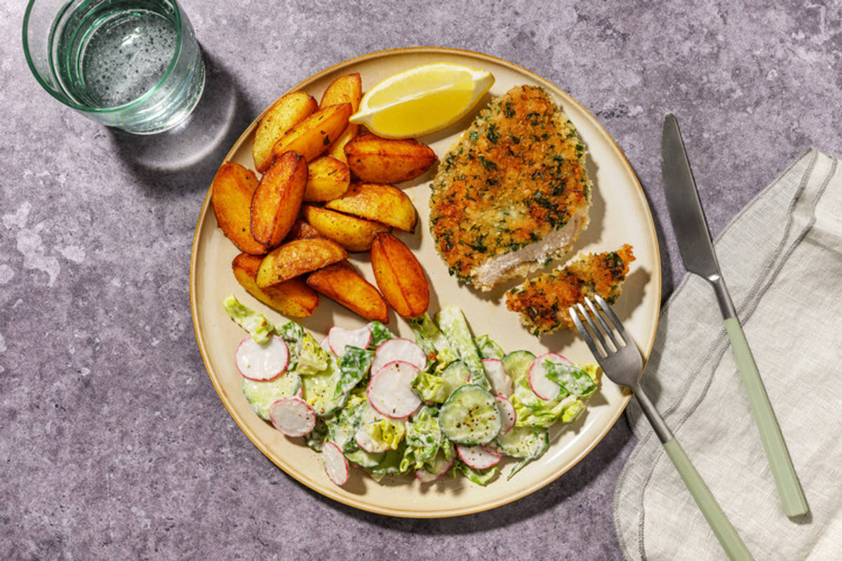 Knuspriges Kräuter-Hähnchenschnitzel mit Paprika-Pommes