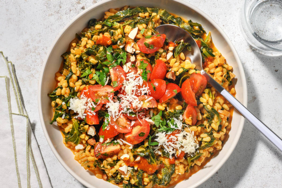 Romige parelgerstrisotto met harissa en boerenkool