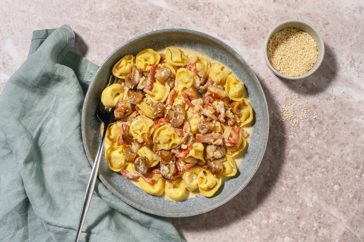 Tortelloni ricotta-épinards, champis & lardons