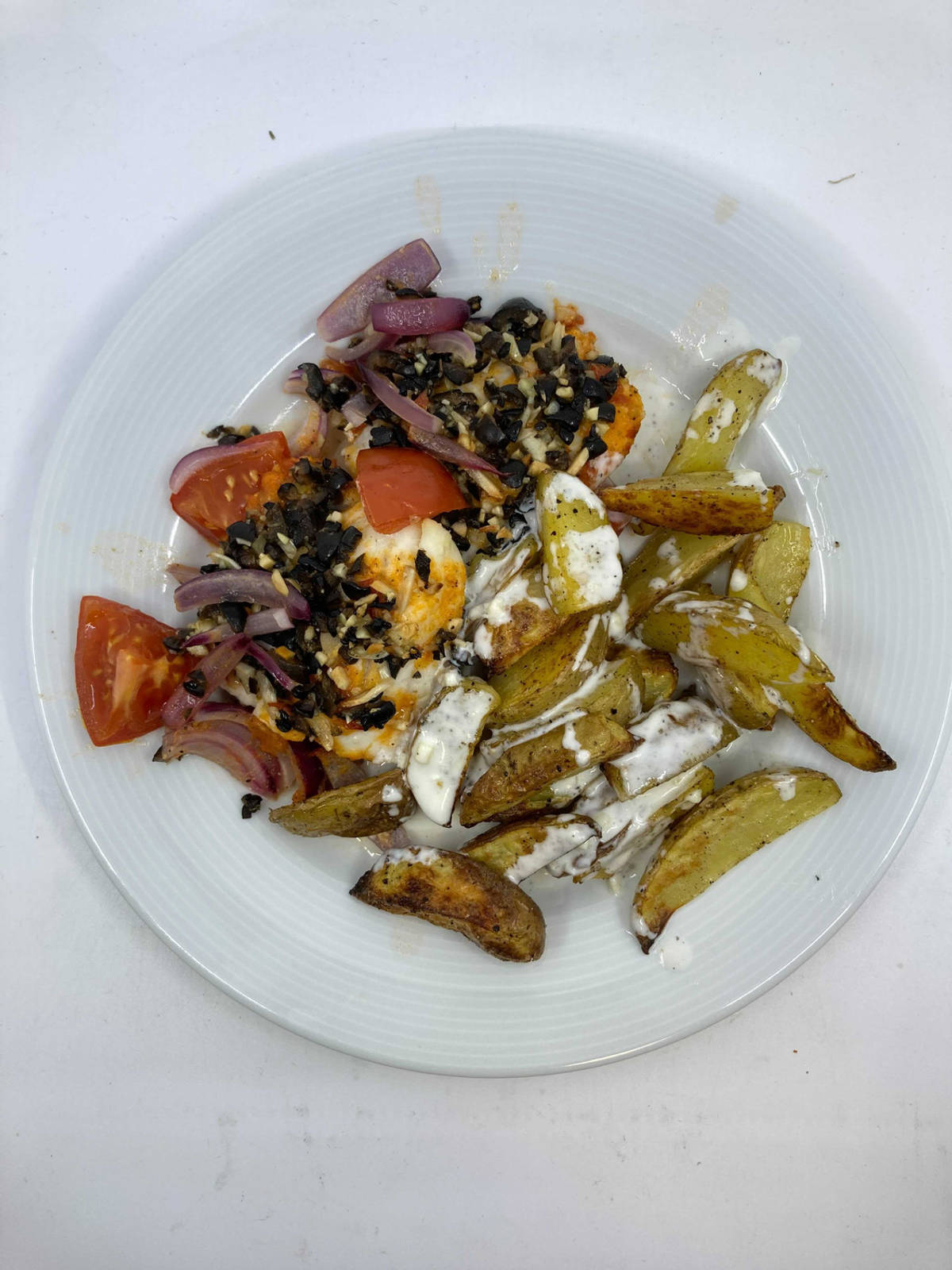 Seelachs mit Oliven-Mandel-Crumble