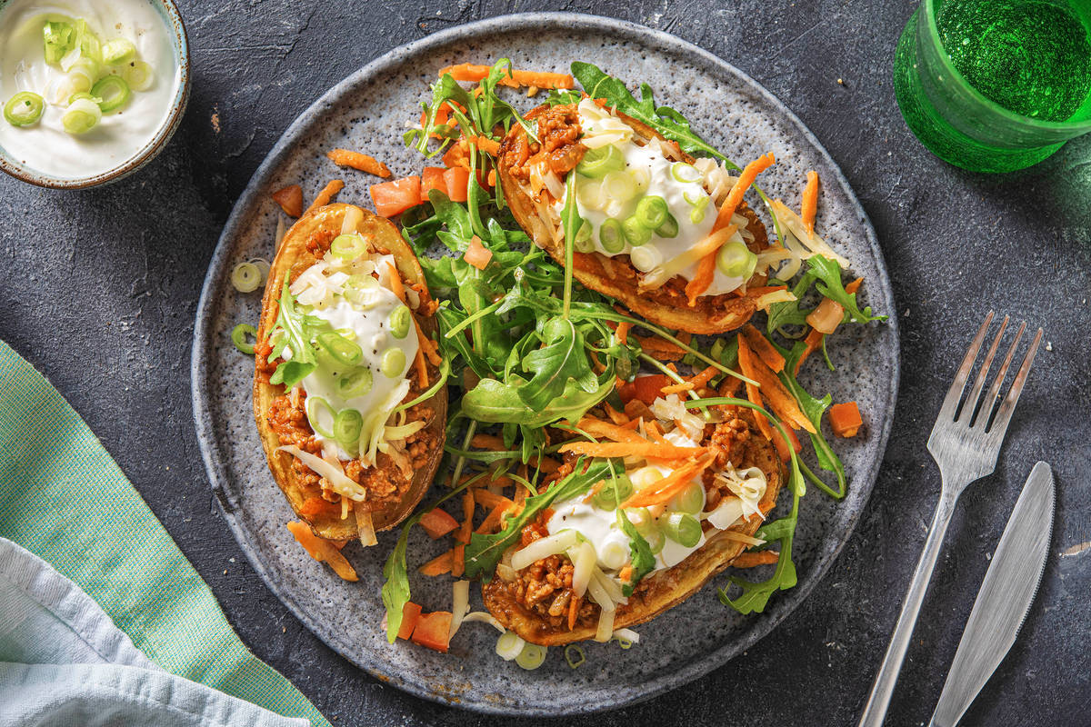 Cheat's Loaded Pork Jacket Potatoes with Sour Cream & Rocket Salad