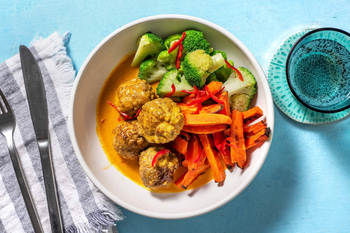Hacktätschli in Currysauce mit Ofenrüebli