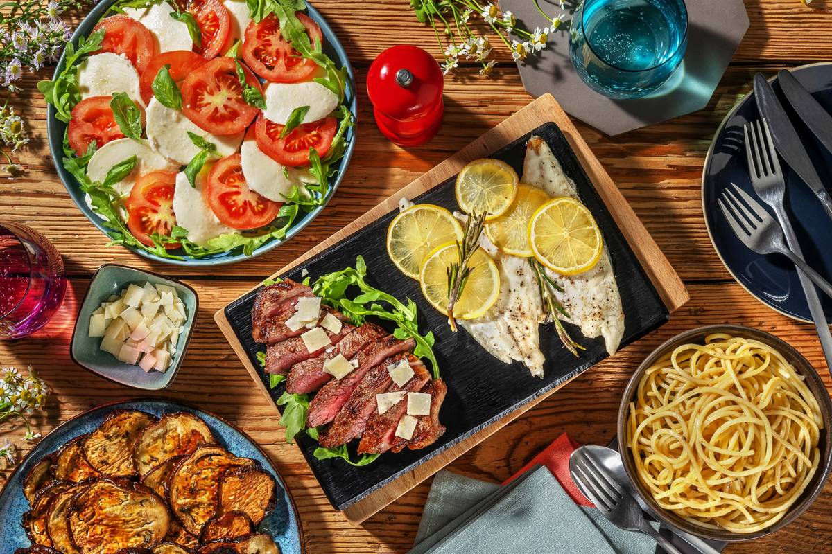 Italiaans feest met dorade uit de oven en tagliata di manzo