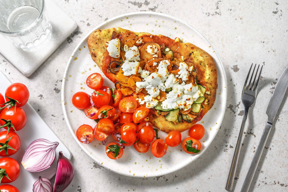 Naanpizza met geitenkaas en groenten