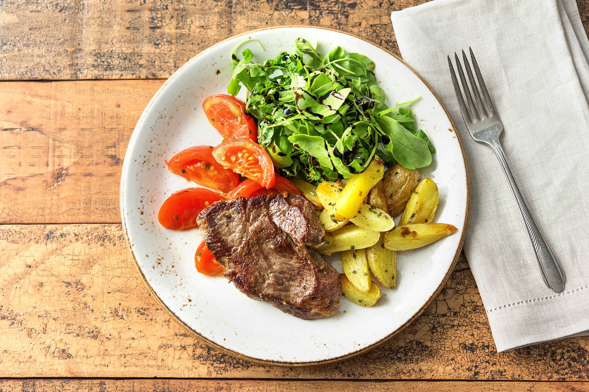 Rindersteak mit geschmorten Tomaten