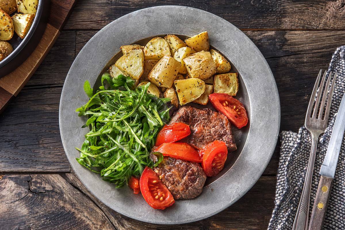 Rindersteak mit geschmorten Tomaten