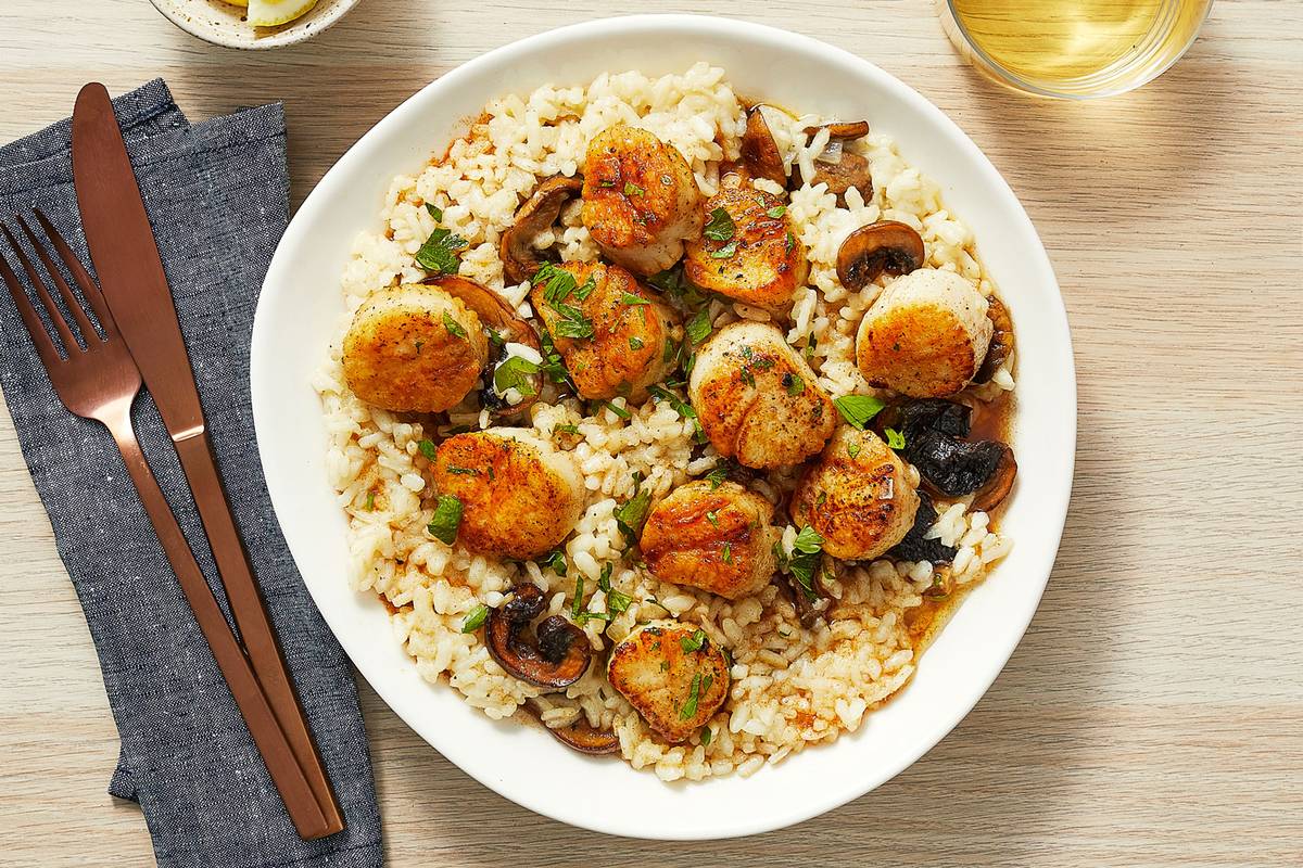 Scallops Over Truffled Mushroom Risotto