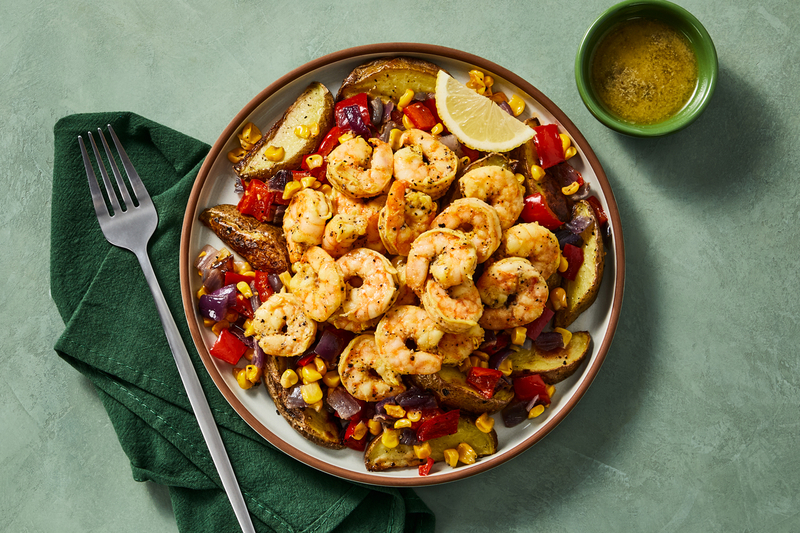 Double crevettes au citron et à l’ail, maïs et poivrons