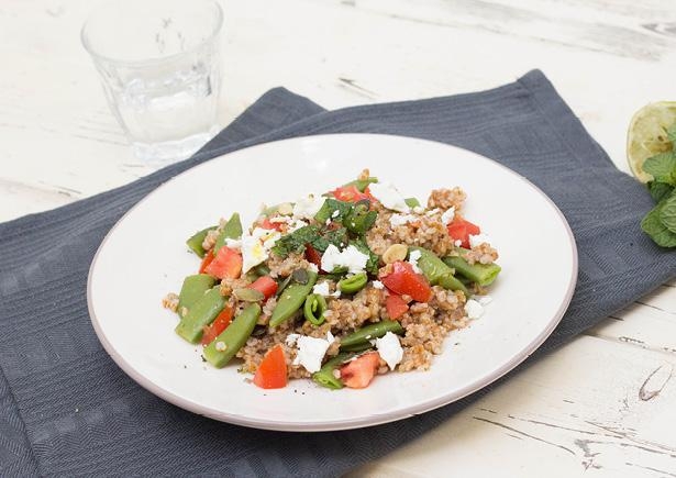 Volkoren bulgur met sugarsnaps, feta en munt