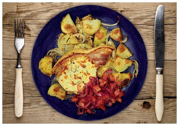 Schweinekotelett mit feiner Käse-Haube